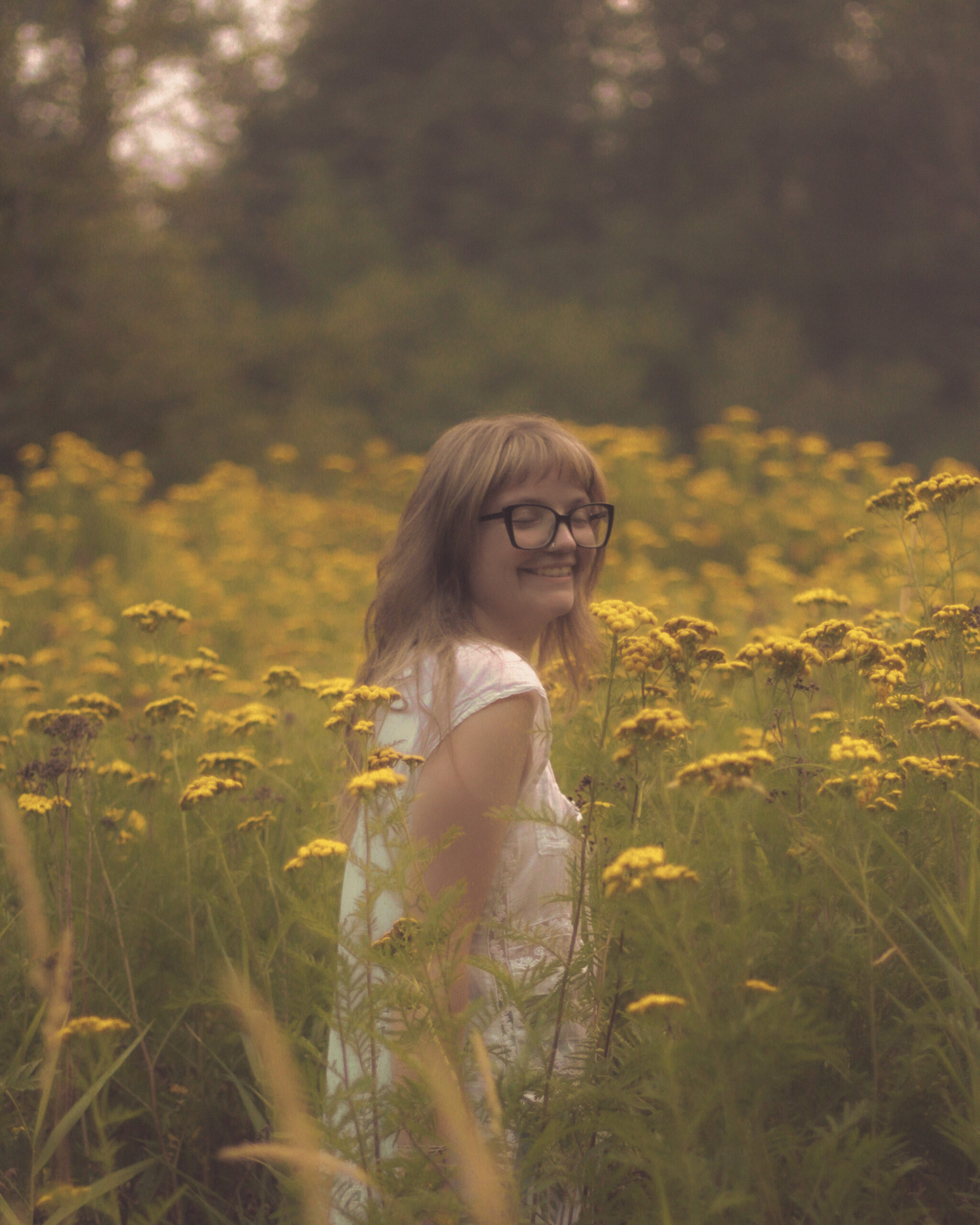 Senior portrait in a field